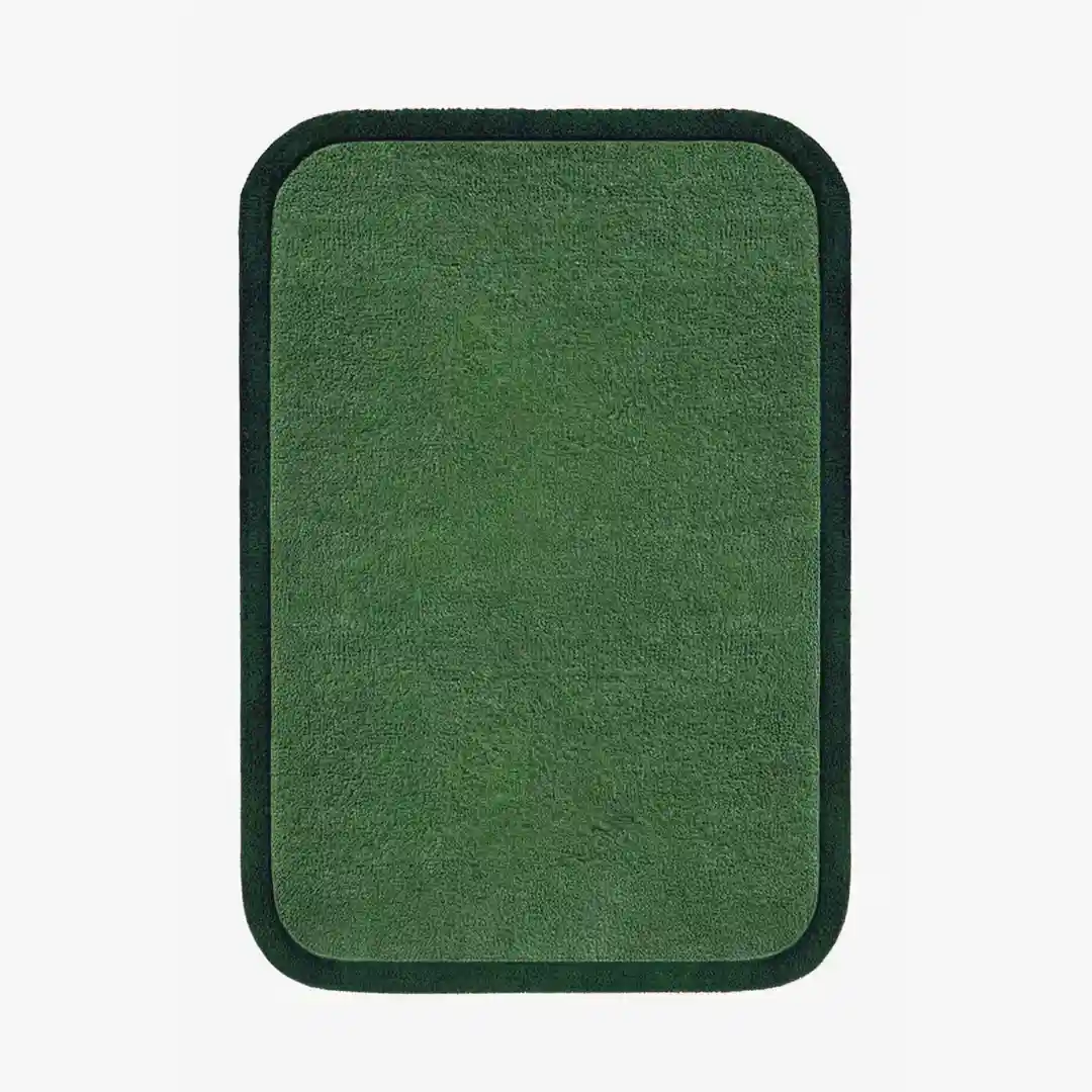 Solid Green Border Hand Tufted Rug made from premium New Zealand wool, featuring a sleek black border and rich rust color