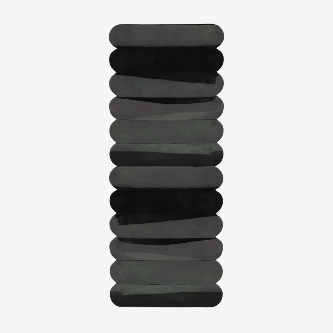 Hand-tufted black pebble-style runner rug with stacked oval design for minimalist interiors