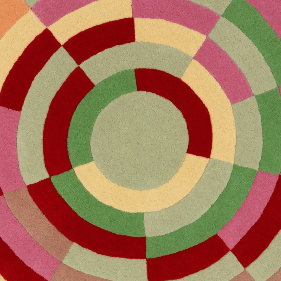 Tufted wool chakra rug with geometric radial design