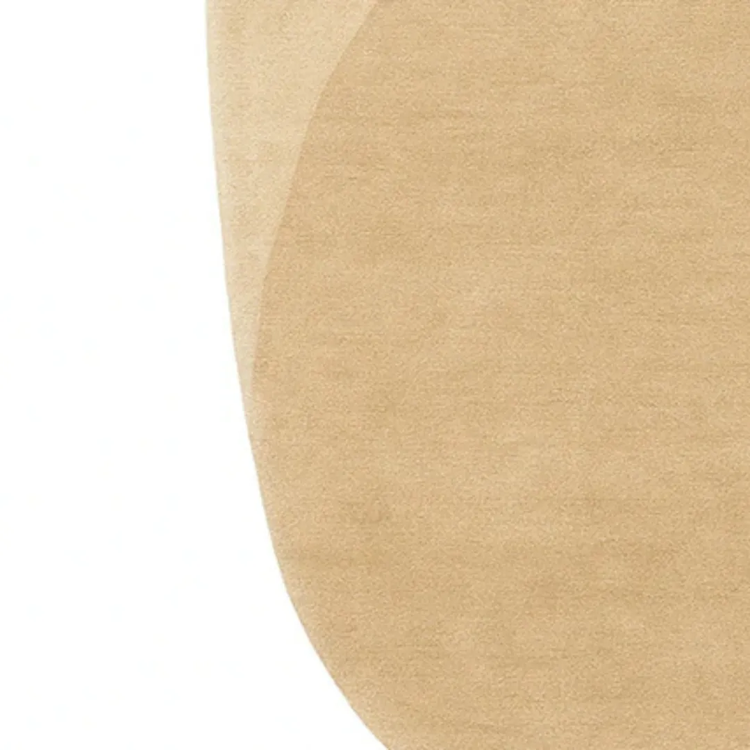 Organic oval wool rug in Japandi-inspired neutral living room