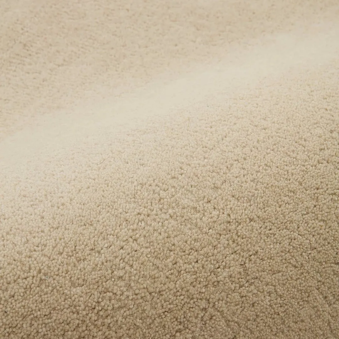 Neutral area rug in Japandi-style bedroom