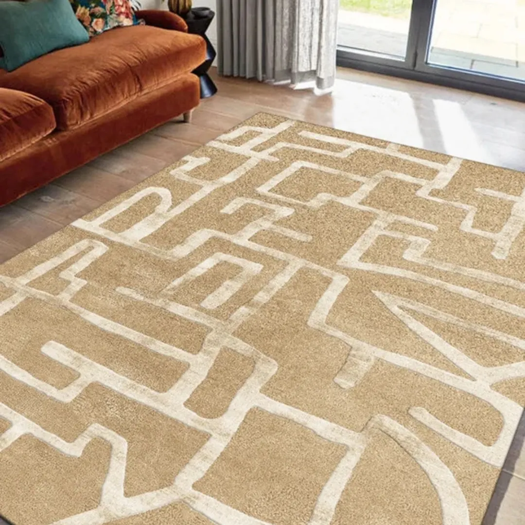 Beige area rug placed in modern, light-filled living space