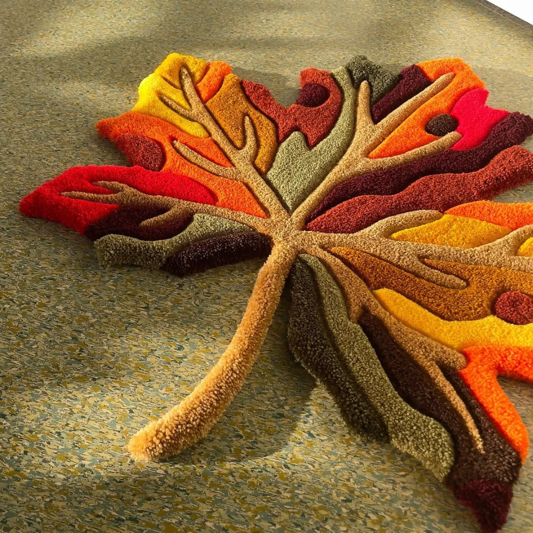 Fall-inspired leaf rug in red, orange, yellow, and brown
