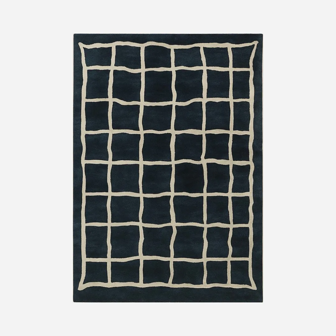 Black Wavy Grid Area Rug Hand tufted black wool rug with wavy ivory grid pattern