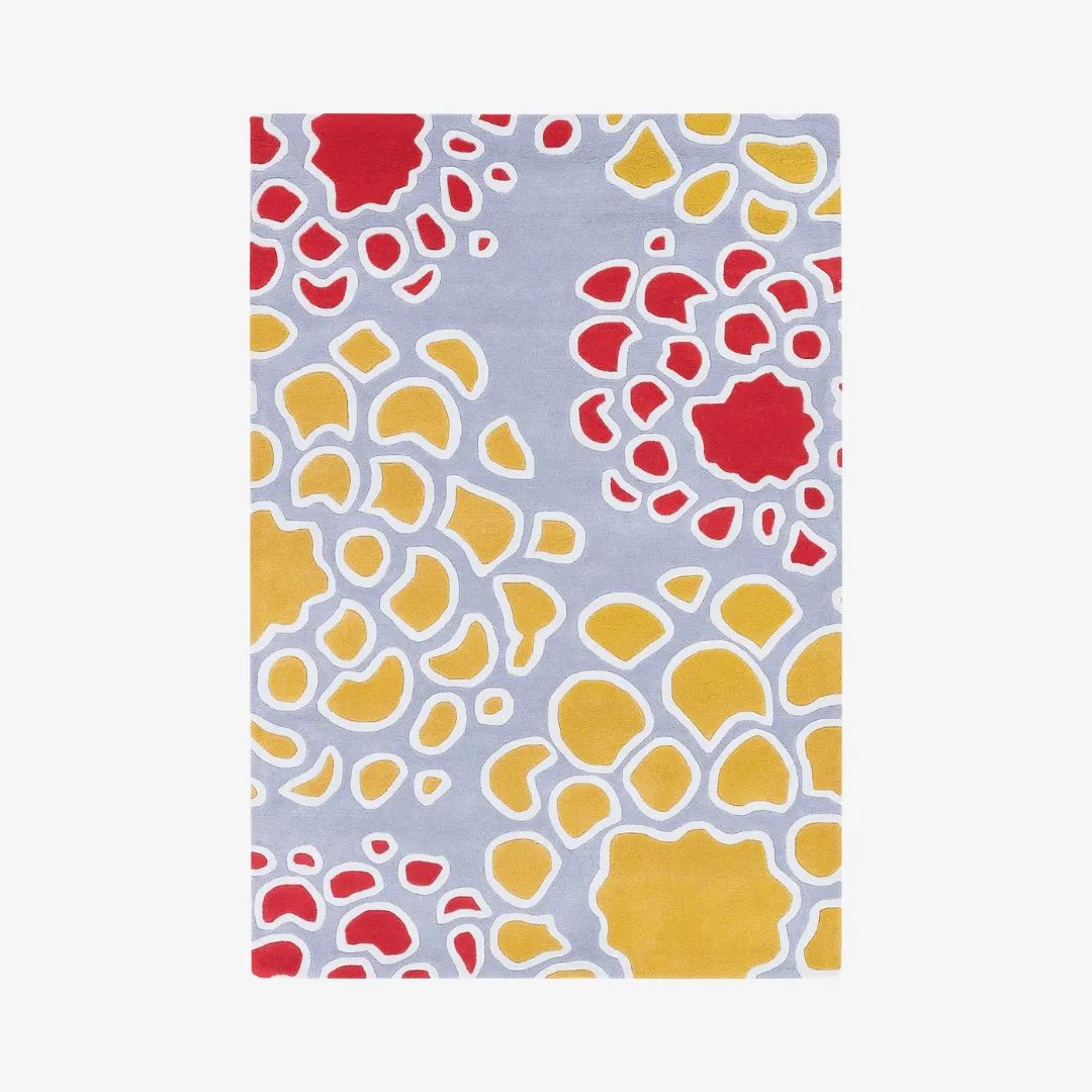 Vibrant floral wool rug in red, yellow, and blue tones