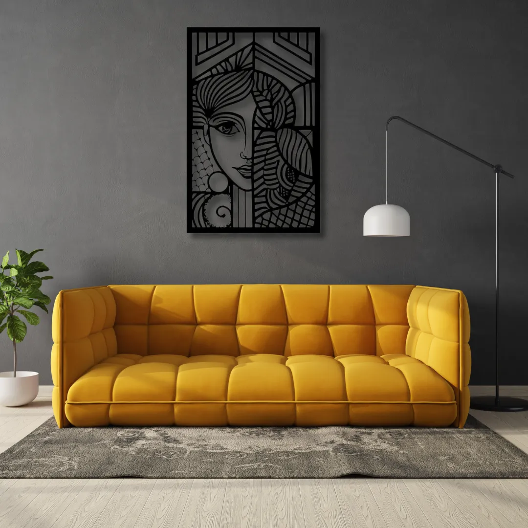 Cubist Muse Black cubist-style woman face metal wall art above yellow sofa