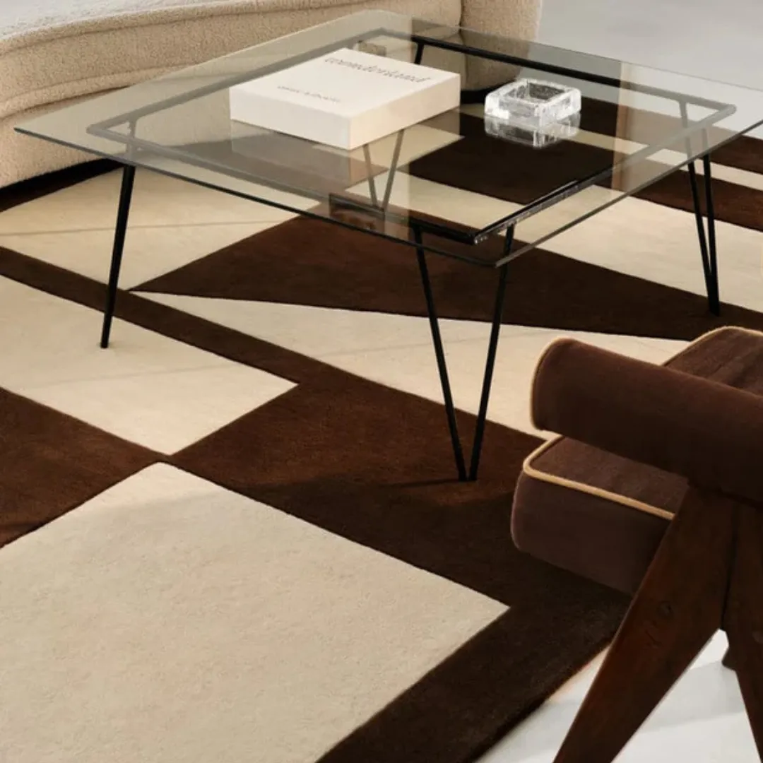 Abstract area rug featuring squares and triangles in a rich brown color.