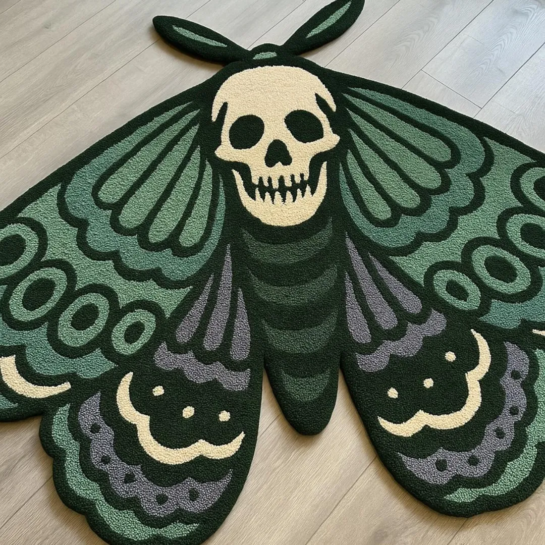 Detailed tattoo-style skull moth rug with intricate wing design