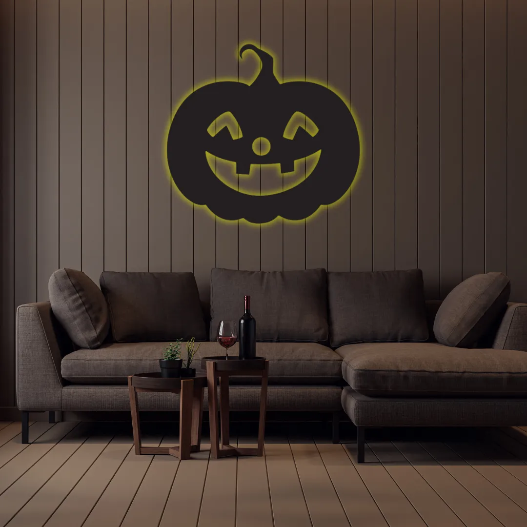 Yellow Pumpkin Glow Silhouette Black smiling pumpkin wall décor above sofa