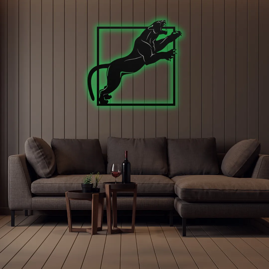 Green Midnight Panther Silhouette Savage panther artwork in black metal frame on white wall.