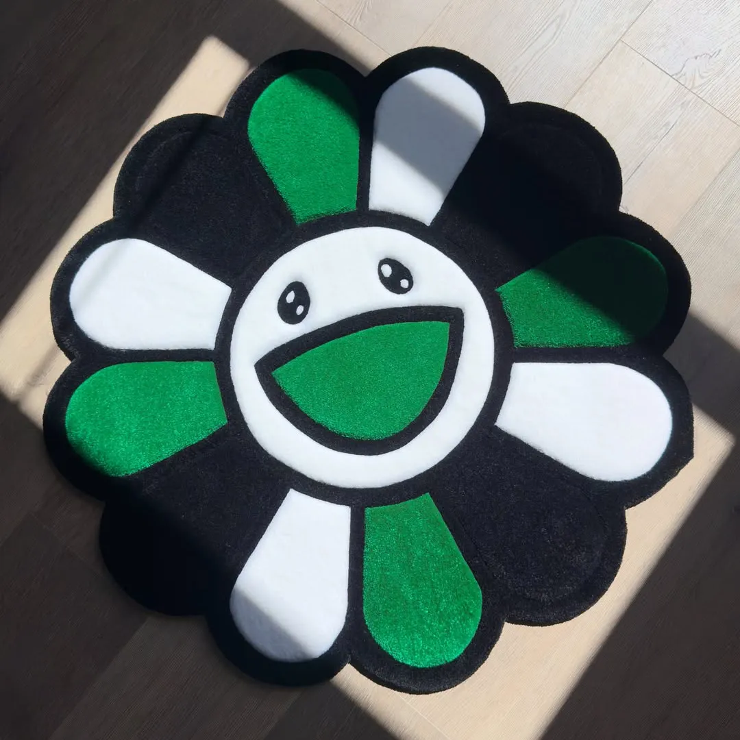 Emerald Bloom Rug Emerald Bloom Rug – Hand-tufted wool rug featuring green, white, and black petals with a joyful smiling face design for modern interiors.