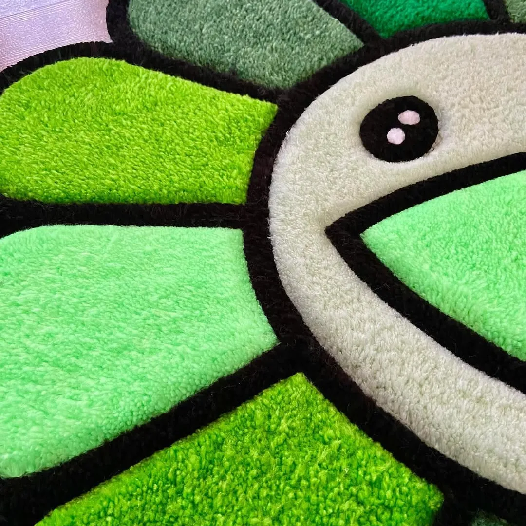 Minty Rug Handmade Minty Muse Rug showcasing layered green tones and a smiling motif, perfect for cozy modern interiors.