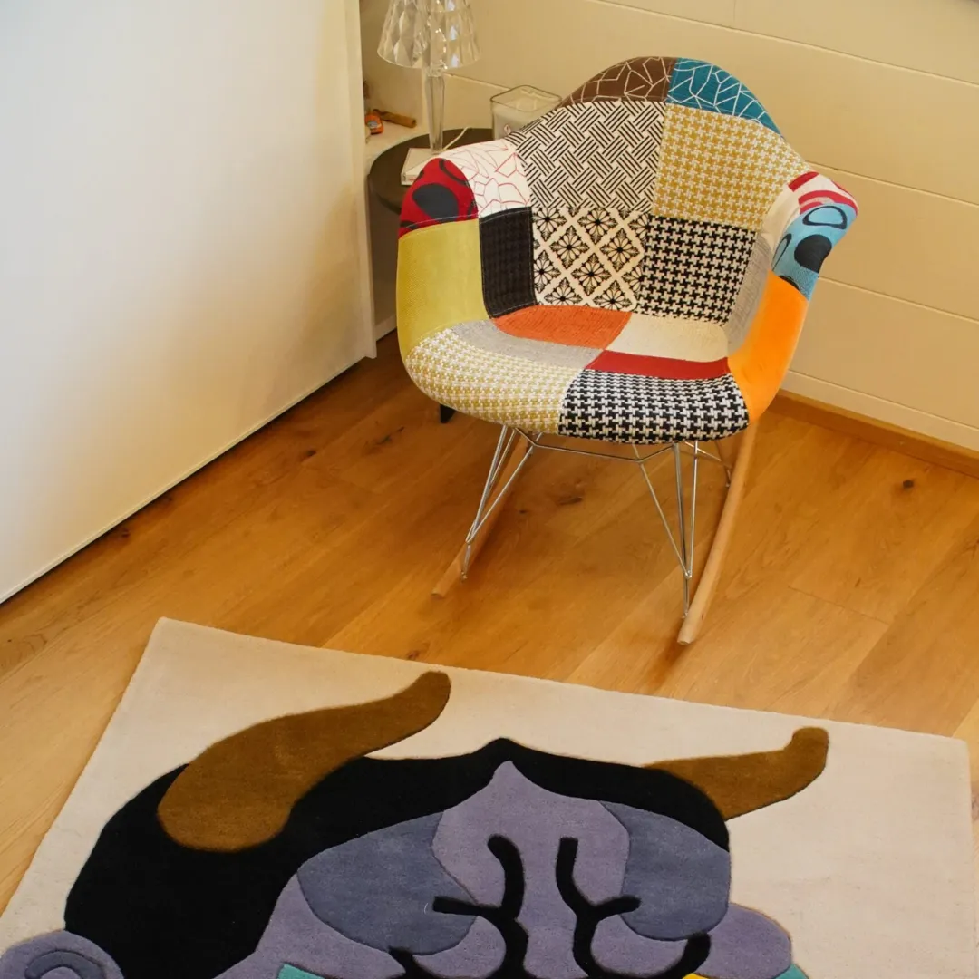 Onyra Rug Placed in Zoom Hand-Tufted Onyra Wool Rug with Striking Oni-Inspired Artwork and Sculpted Texture