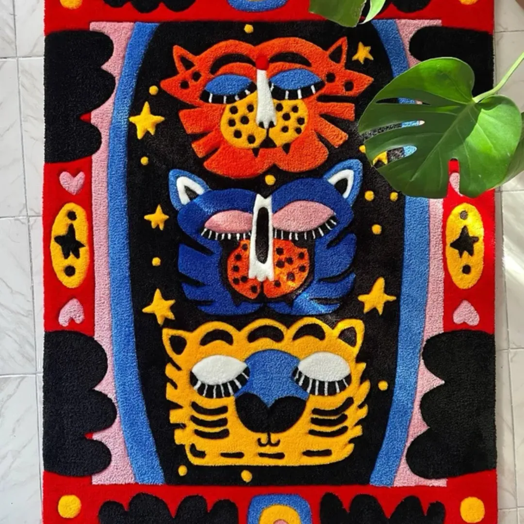 Totem Mirage Tattoo Rug Vibrant Totem Mirage Rug with bold abstract faces and geometric border in red, blue, and yellow tones