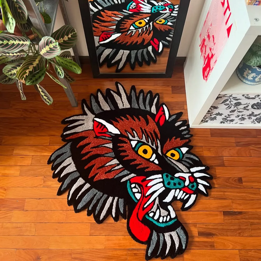 Wild Howl Inked Rug Wild Howl Rug featuring fierce wolf face design with red tongue and yellow eyes – hand-tufted rug by Sneagear