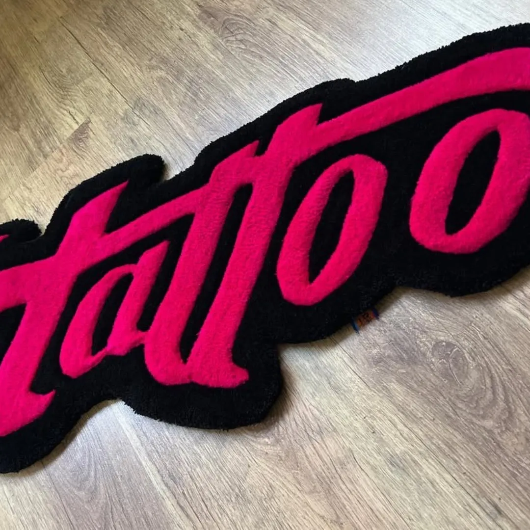 Crimson Script Tattoo Rug Tattoo-style rug with red script typography and black background – Crimson Script Rug