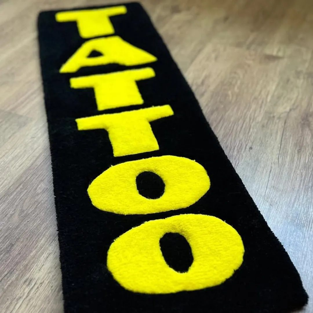 Neon Rug Tattoo-style rug with bold neon yellow typography – Neon Script Rug