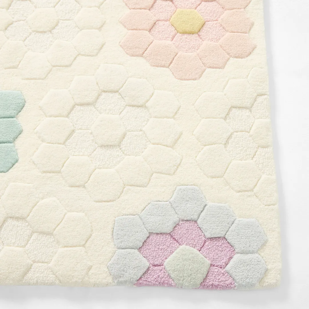 Pollen Rug Geometric floral rug with pastel-colored hexagon petals – Pollen Prism handmade wool rug