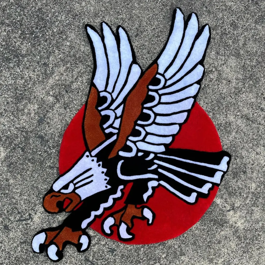 Silent Wings Inked Eagle Tattoo Rug Full View Full shot of the hand tufted Silent Wings rug highlighting the bold black outlines and vibrant red and white colors.