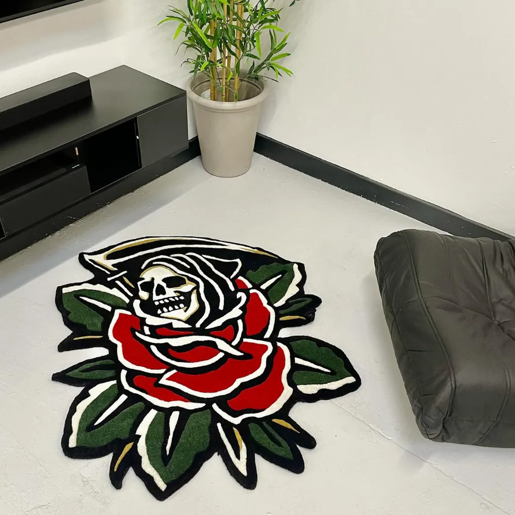 Grim Reaper And Rose Shaped Floor Rug Angled shot of the Grim Reaper and Rose rug placed in a modern living room, highlighting the bold black outlines and the unique die cut shape of the design.