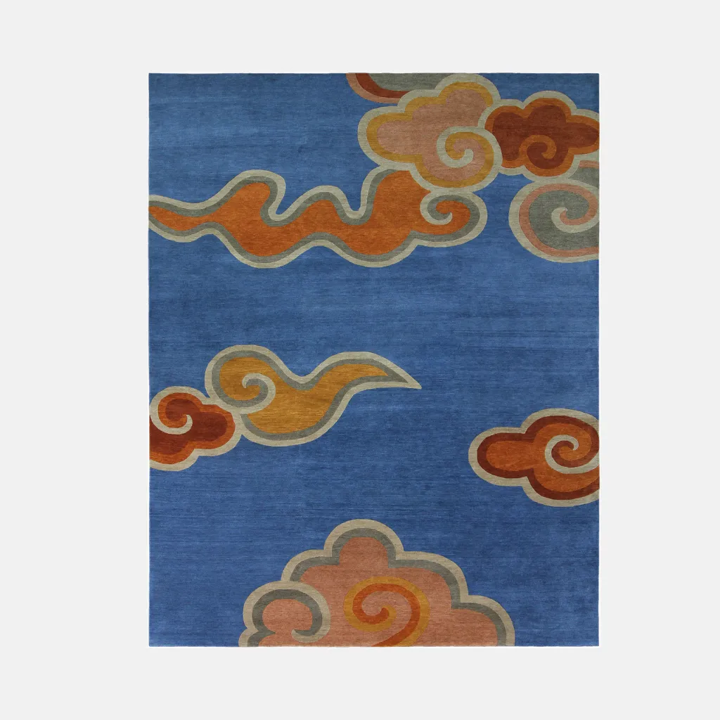 skybound weave blue sky pattern rug flat lay Top down view of the Skybound Weave rug featuring a floating cloud design in earthy tones against a solid azure blue background.
