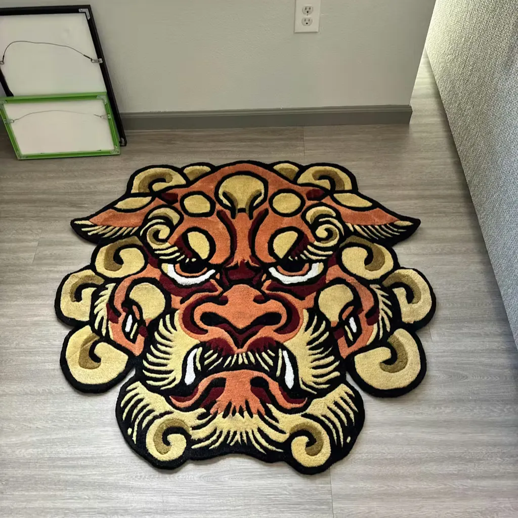 traditional asian tattoo style rug Angled perspective of the hand tufted Foo Dog rug on a dark wooden floor, highlighting the vibrant orange and yellow colors of the Japanese tattoo inspired design.