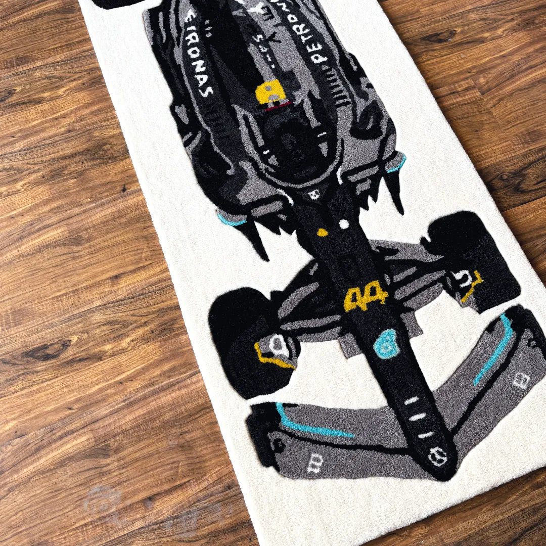 scarlet pulse rug mercedes style race car High angle view of the Scarlet Pulse rug showcasing the sleek aerodynamic shape of the F1 car design, accented by a red airbox detail and teal wing tips.