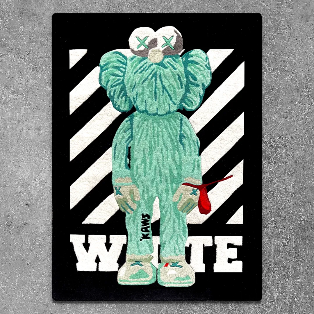 virx column rug top Top-down view of the rectangular Virx Column rug, featuring a mint green streetwear-inspired fuzzy character with X-eyes standing against a black background with bold white diagonal stripes and the word "WHITE" at the bottom.