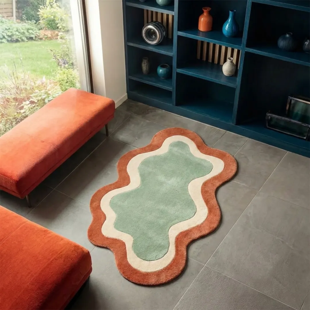 wellonest rug angle High-angle lifestyle view of the Wellonest rug showcasing its plush hand-tufted wool texture and elegant, curved design in a sunlit modern interior.