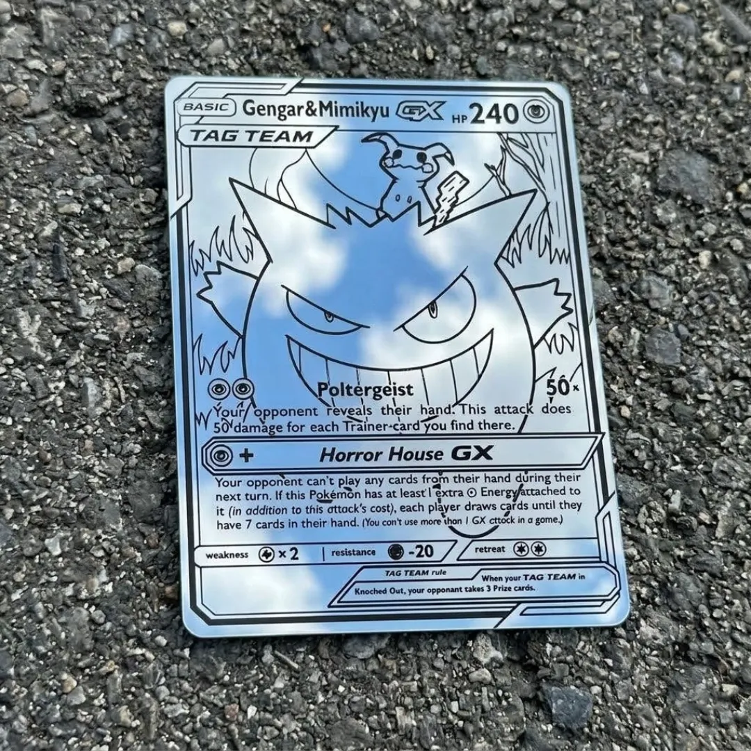 ghost duo mirror decor asphalt Rectangular Ghost Duo Mirror Wall Decor laid flat on textured dark asphalt, showing a crisp reflection of the sky through its intricate etched design.