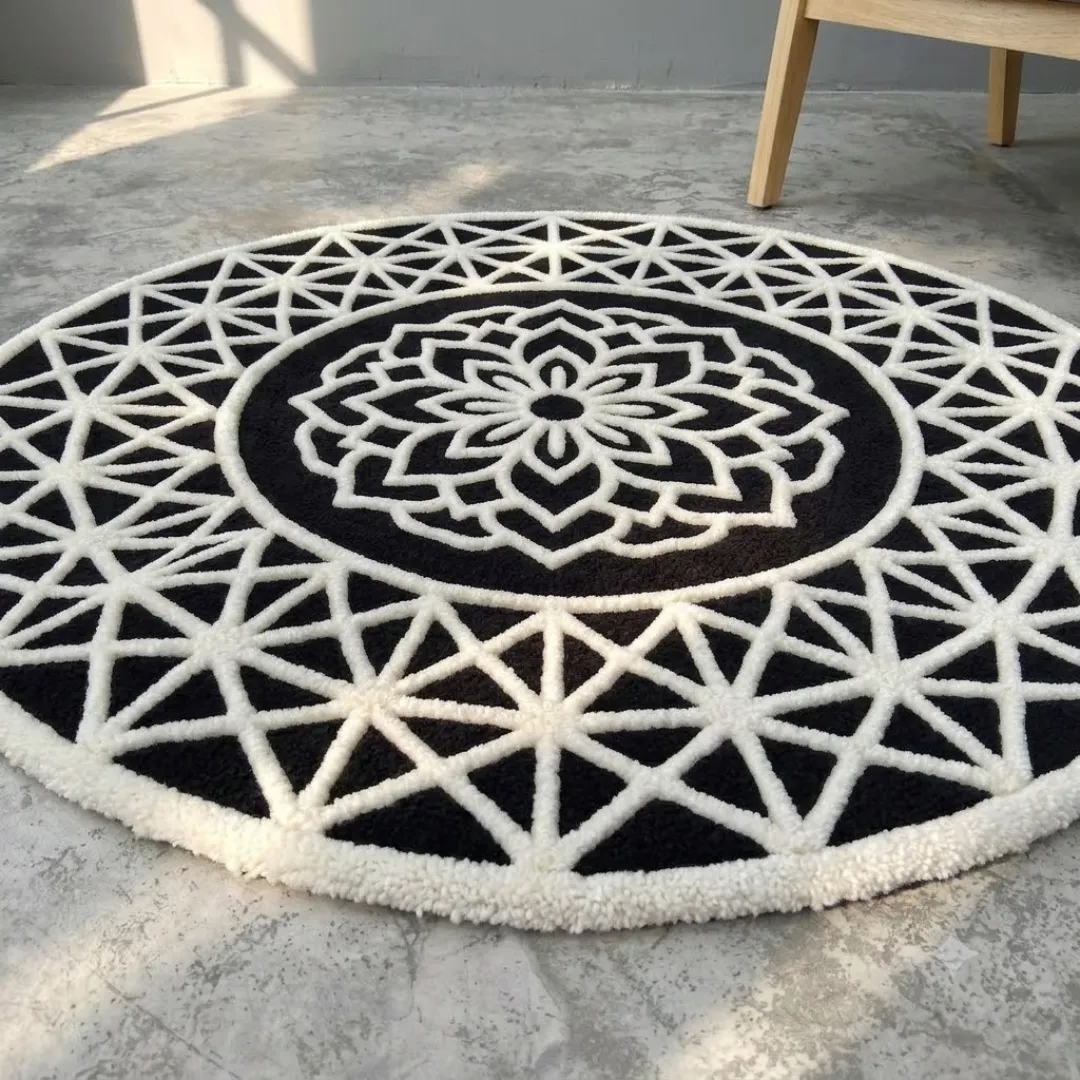 midnight noir crest round rug side angle Low side-angle perspective shot showing the plush texture, pile depth, and intricate geometric border patterns of the Midnight Noir Crest rug.