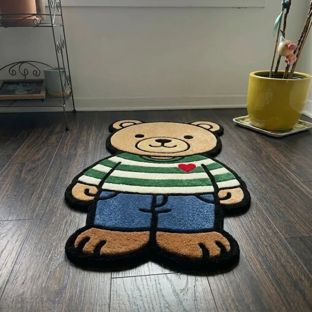 stormbound ape shaped area rug perspective detail An angled perspective shot of a hand-tufted stormbound ape rug, highlighting its playful silhouette and high-quality tufted wool texture on a wooden floor.
